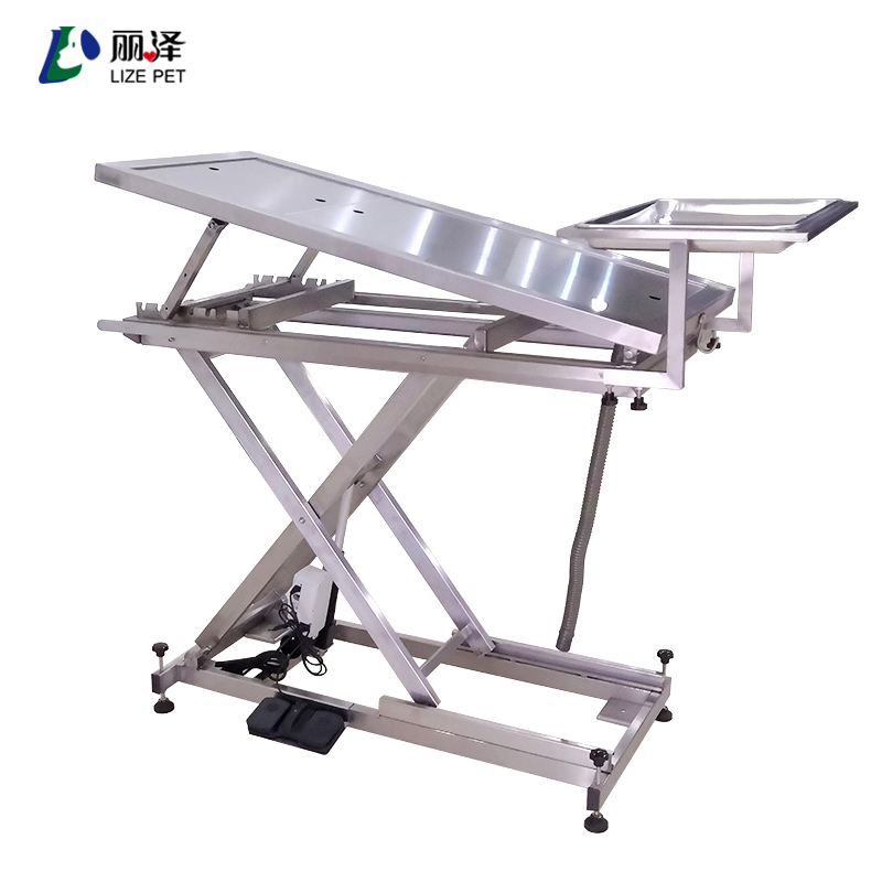 Electric lifting and tilting operating table with inlay